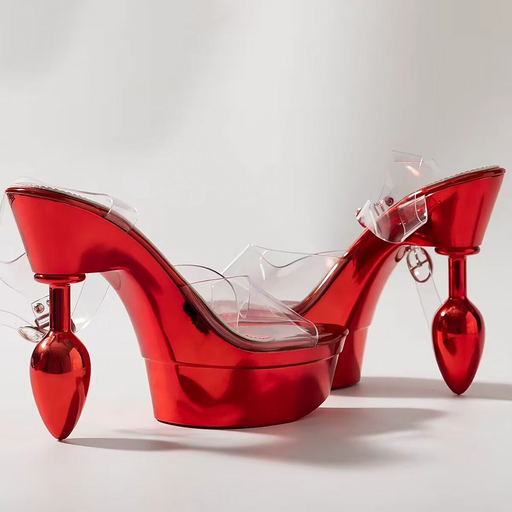 Profile view highlighting the 14.5cm metallic red plug-shaped heel stem and clear PVC upper construction.