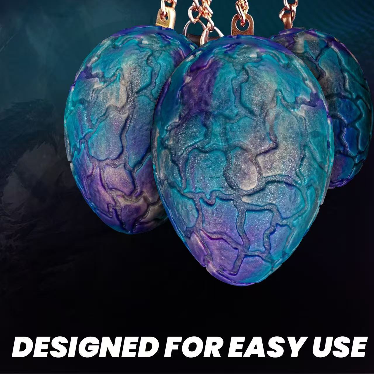 Drachenei-Analdildo | Fantasy-Analdildo mit schillernder Drachenschuppenoptik und Zugkette