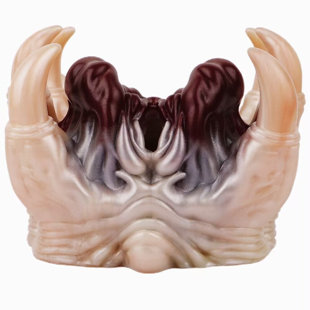 Front view of alien facehugger fantasy stroker showing clawed legs and deep inner chamber