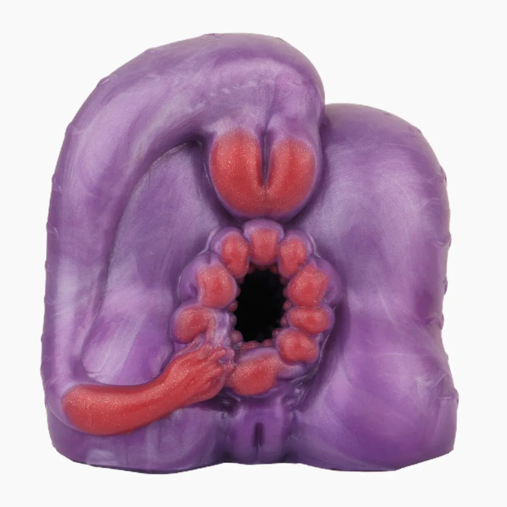 Close-up of the alien masturbator toy entrance showing deep textured fleshy ridges, carnivore-inspired red soft teeth, and ultra-tight tunnel entry.