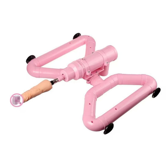 Pink automatic thrusting sex machine with stable suction cup base and attachment.