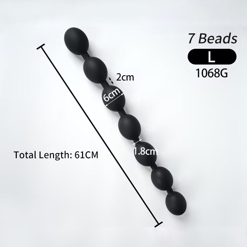 Black matte silicone 6 bead anal plug XL size showing 7.0cm bead size 62cm total length 1475g weight measurements.