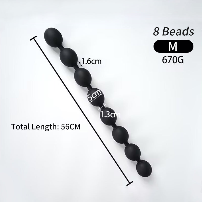 Black matte silicone 7 bead anal plug L size showing 6.0cm bead diameter 61cm total length 1068g weight.