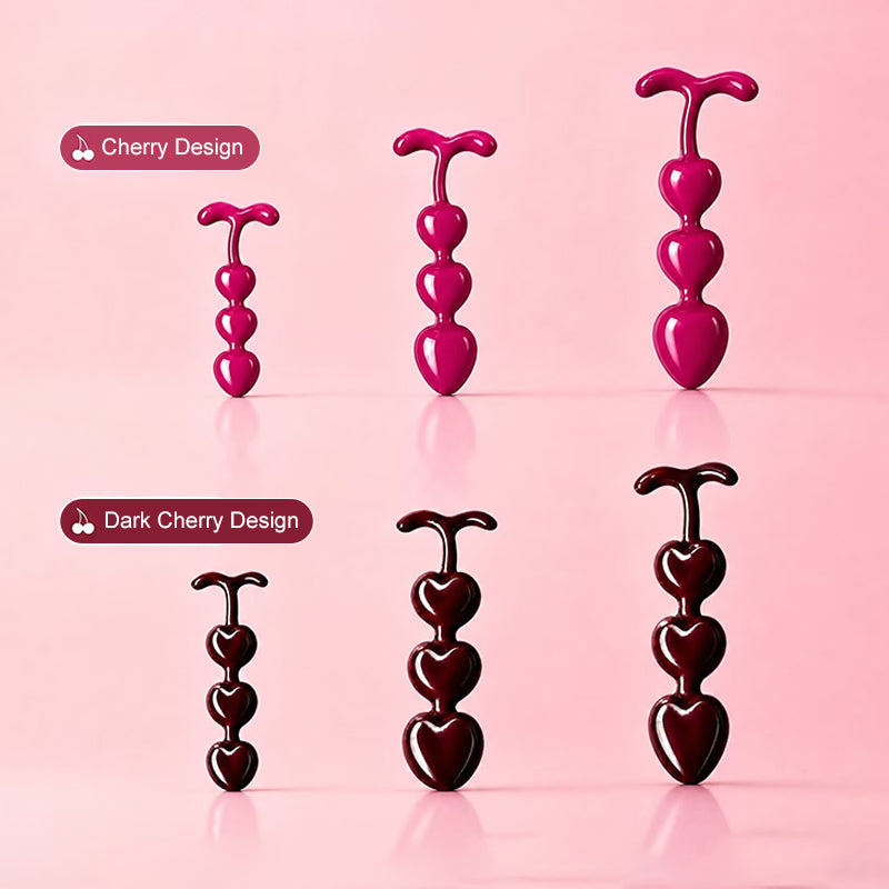 Comparison of cherry design and dark cherry design anal plug beads available in multiple sizes.