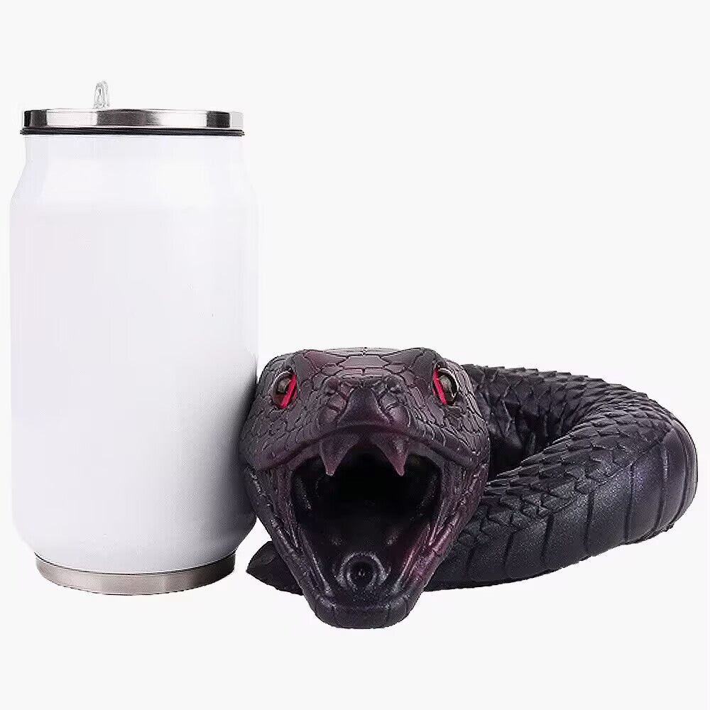 Coiled purple snake fantasy stroker next to a tumbler for realistic scale comparison