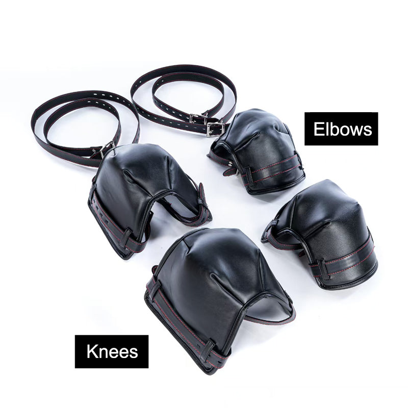 Black leather crawling elbow pads and knee pads set with harness straps.
