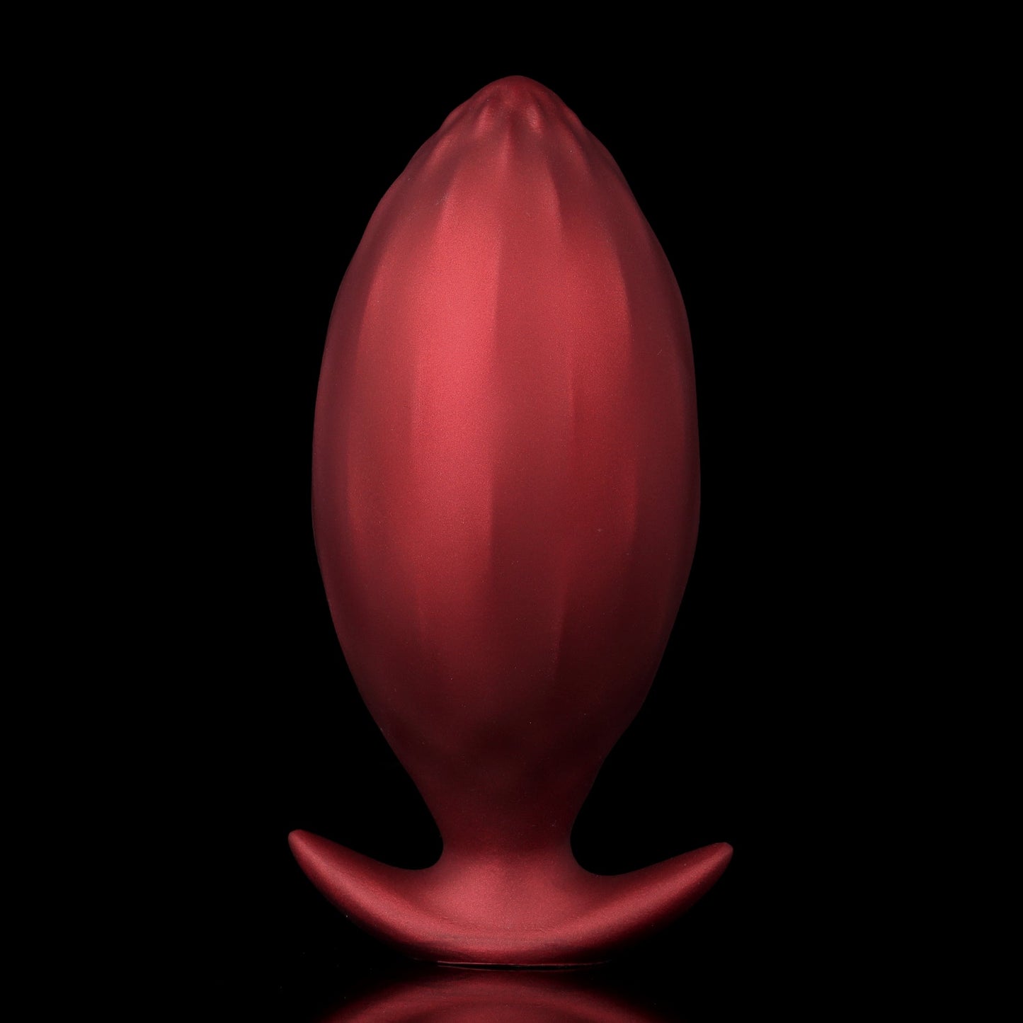 Smooth contoured back view of the crimson red inflatable anal plug with a safe, wide flared anchor base.