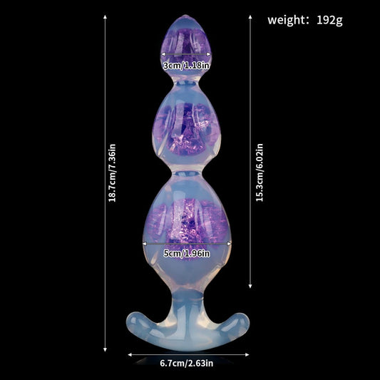 Dimension guide of crystal jelly liquid silicone anal beads in purple showing total height of 18.7cm and flared base of 6.7cm.