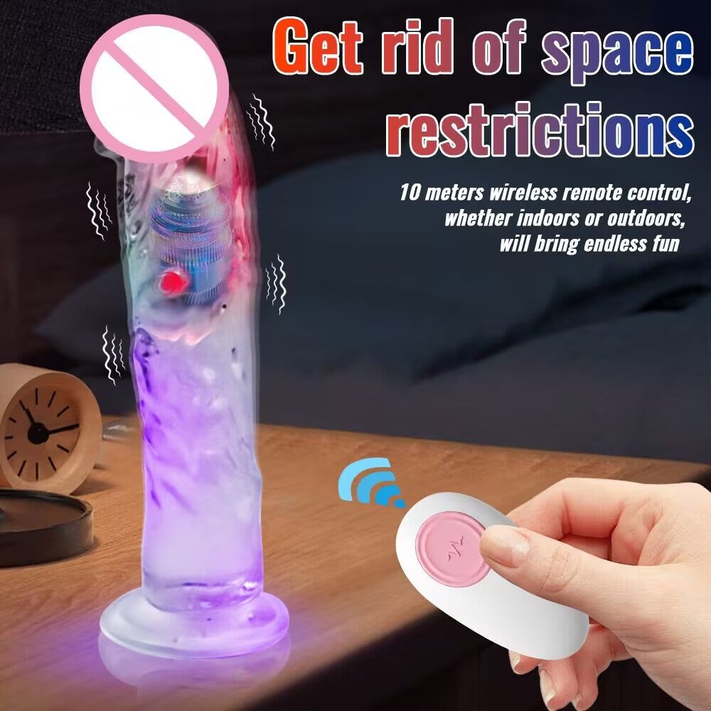 Crystal clear vibrating dildo with wireless remote control placed on a nightstand for hands-free adult play