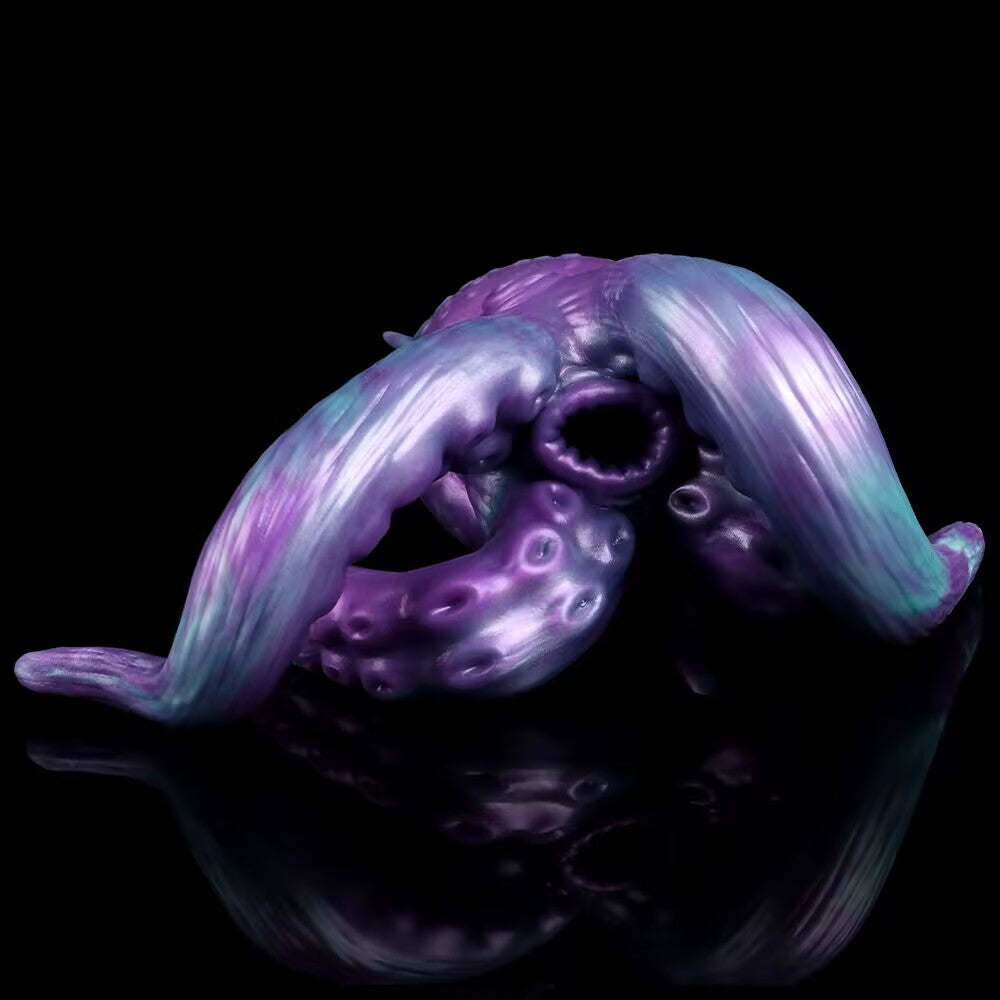 Close-up of the bottom tentacle base entrance showing internal texture and suction hole
