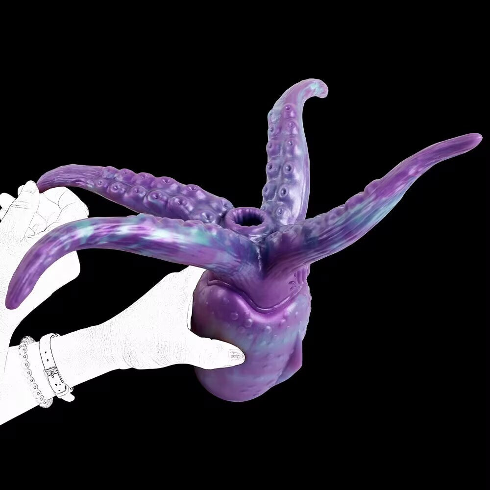 Hands holding the flexible tentacles of the Cthulhu stroker to highlight the inner entry channel