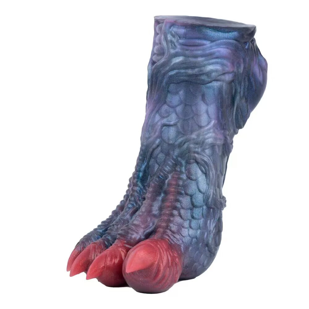 Detailed view of dragon claw male toy showing realistic scaly skin and sharp red claws.