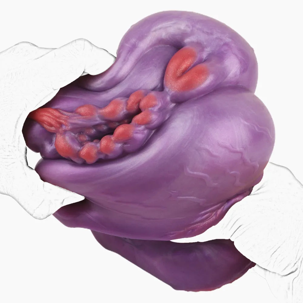 Hands squeezing and twisting the flexible purple alien pocket pussy masturbator, highlighting the durable, non-tearing, and ultra-plush premium TPE structure.