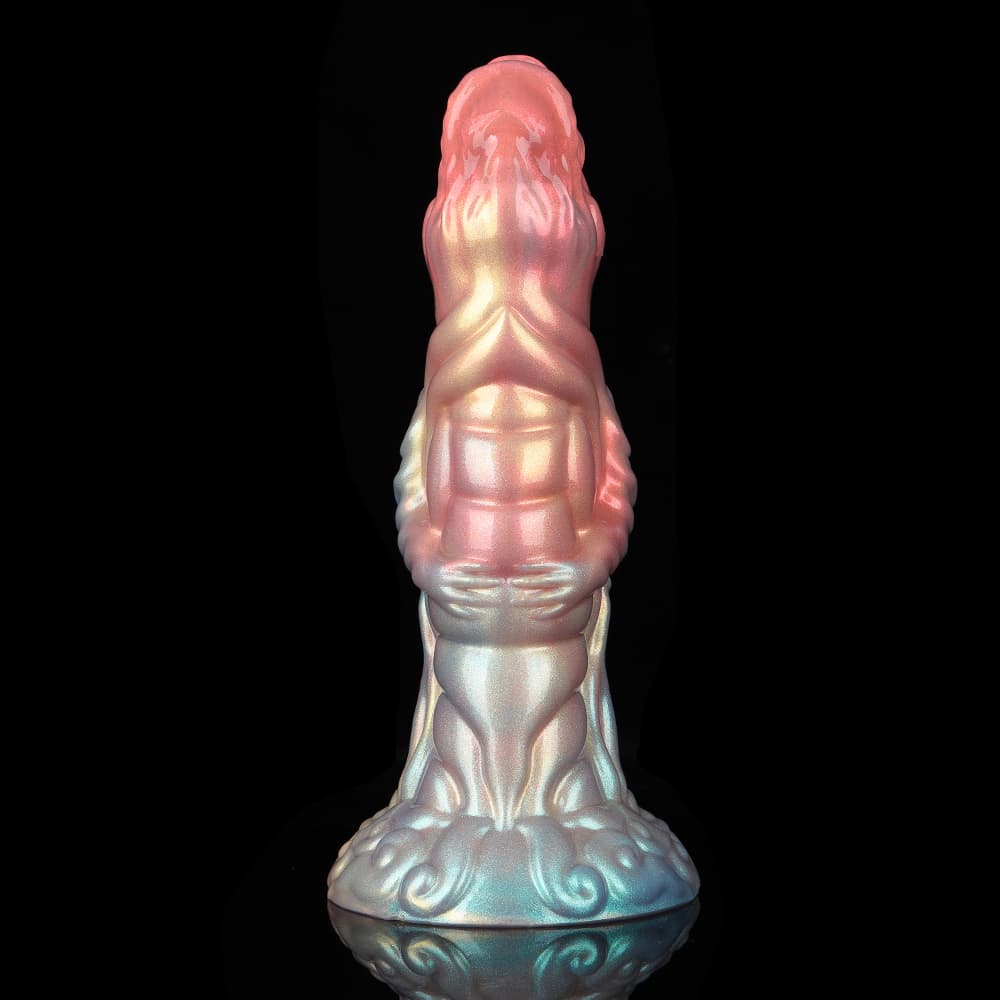 Front view of an eldritch monster silicone dildo showing the symmetrical abdominal muscle ridges and humanoid creature arms wrapped around the shaft.