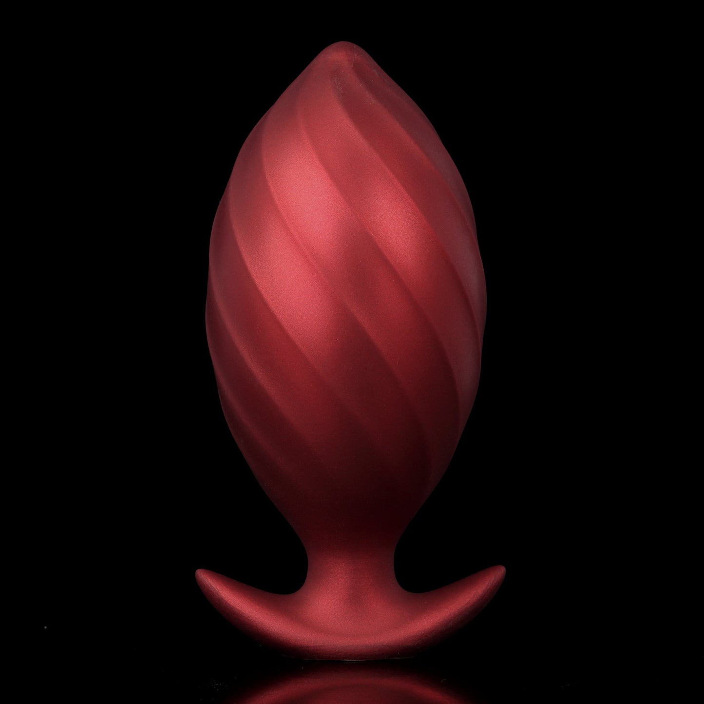 An fully expanded matte red inflatable plug showing the smooth, full bulbous shape designed for intense satisfaction and comfortable fullness.