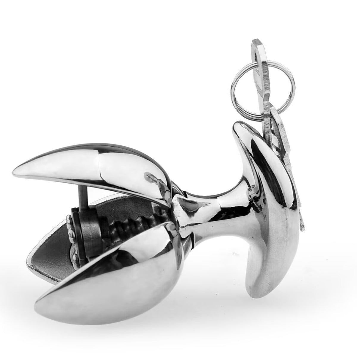 Side view of silver expanding metal blossom plug in open blossom shape with key inserted into base.