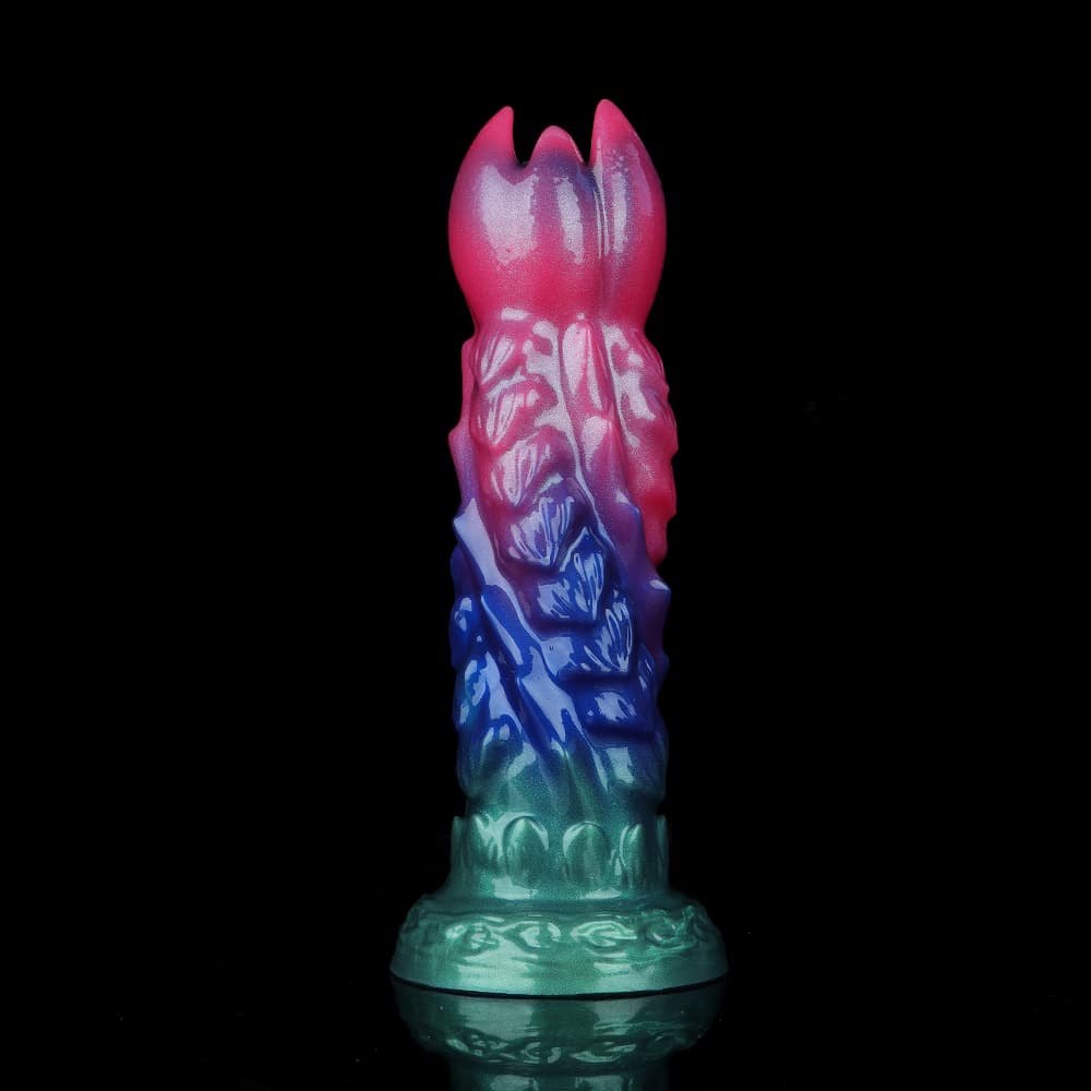 Side profile of the vertical mythical beast fantasy dildo highlighting the mesmerizing three-color metallic gradient from magenta to dark blue and green with infused glitter.