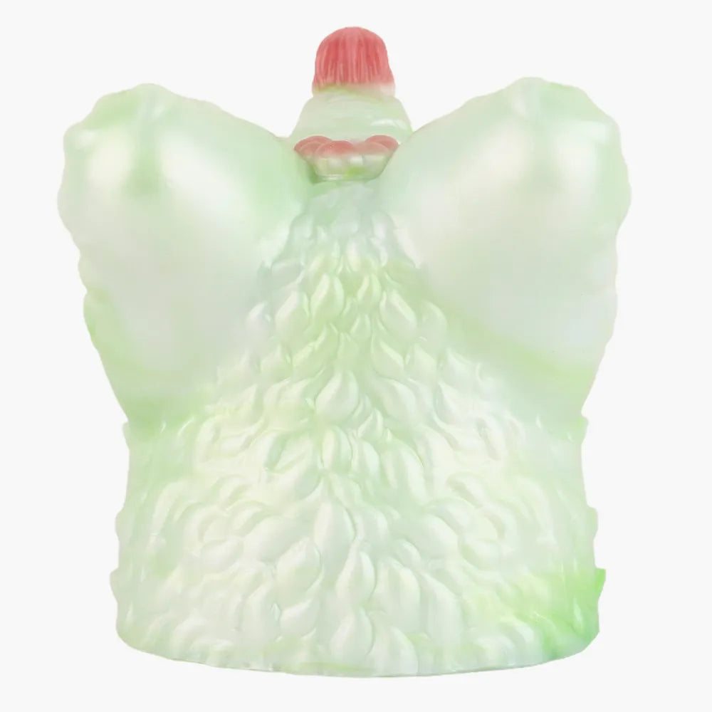 Top-down view of the green and pink fantasy creature male masturbator with heavy anatomical shaping.
