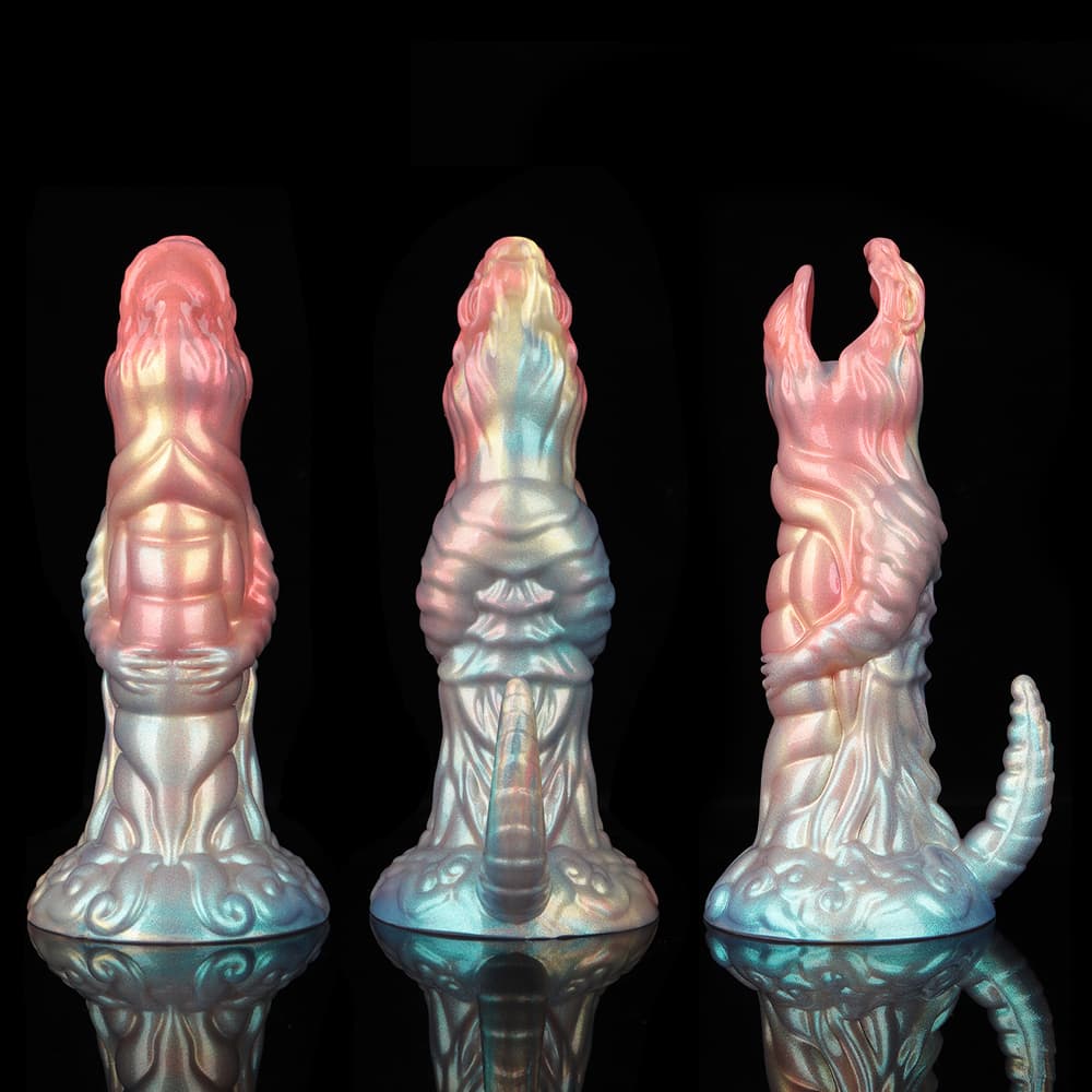 Front, back, and side views of a chameleon pearlescent fantasy oviposition toy showing its biomechanical texture, alien scale patterns, and a curved creature tail base.