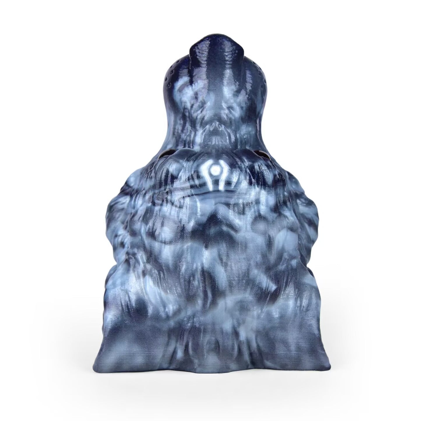 Top-down view of a fantasy marbled blue-grey silicone masturbator shaped like a wolf's head.