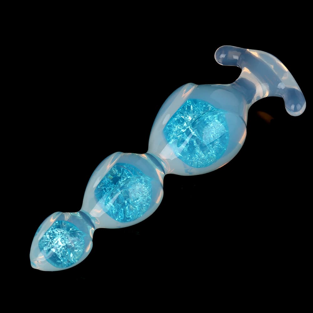 Glossy flexible blue silicone anal beads plug angled view highlighting the premium liquid silicone clarity.