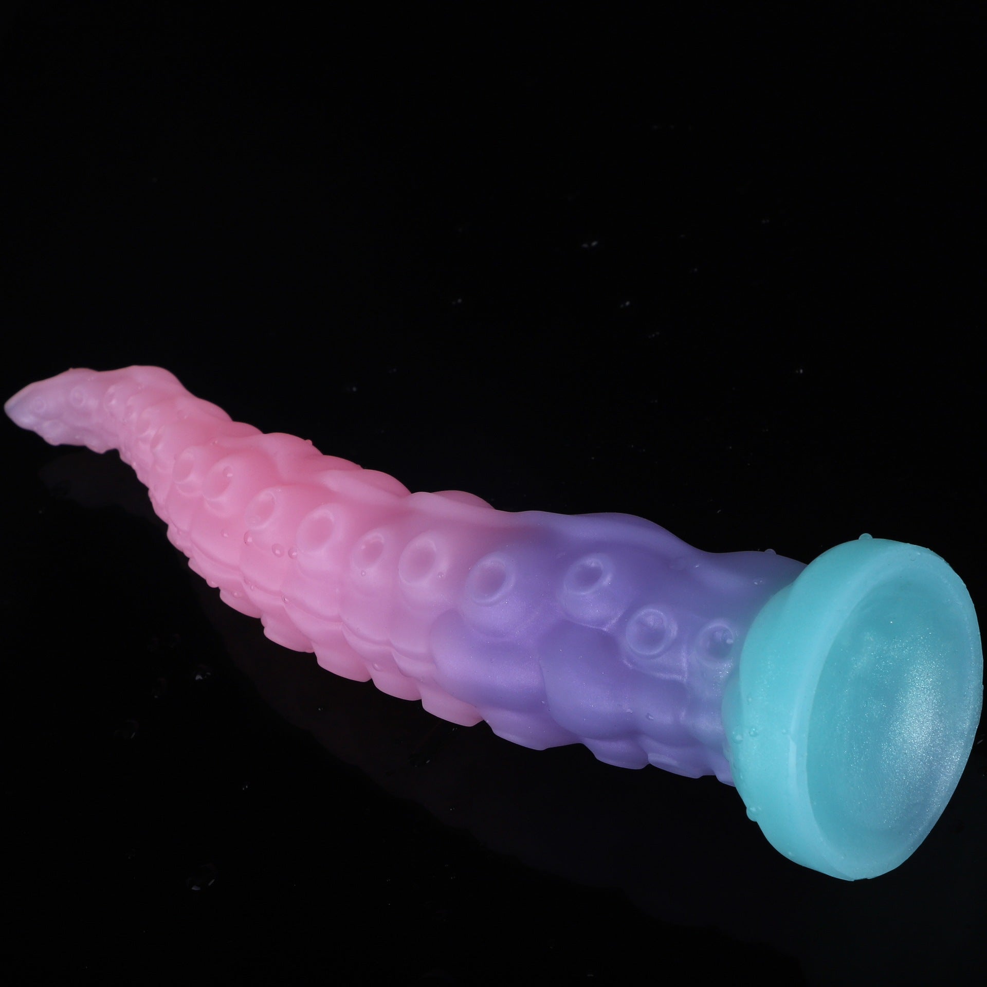 Dynamic view of the flexible gradient tentacle toy with a powerful bottom suction cup.
