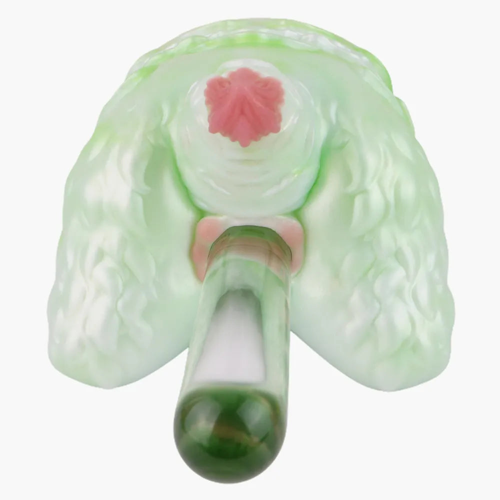 Front view of the furry fantasy monster stroker with a clear warming rod inserted into the textured tunnel.