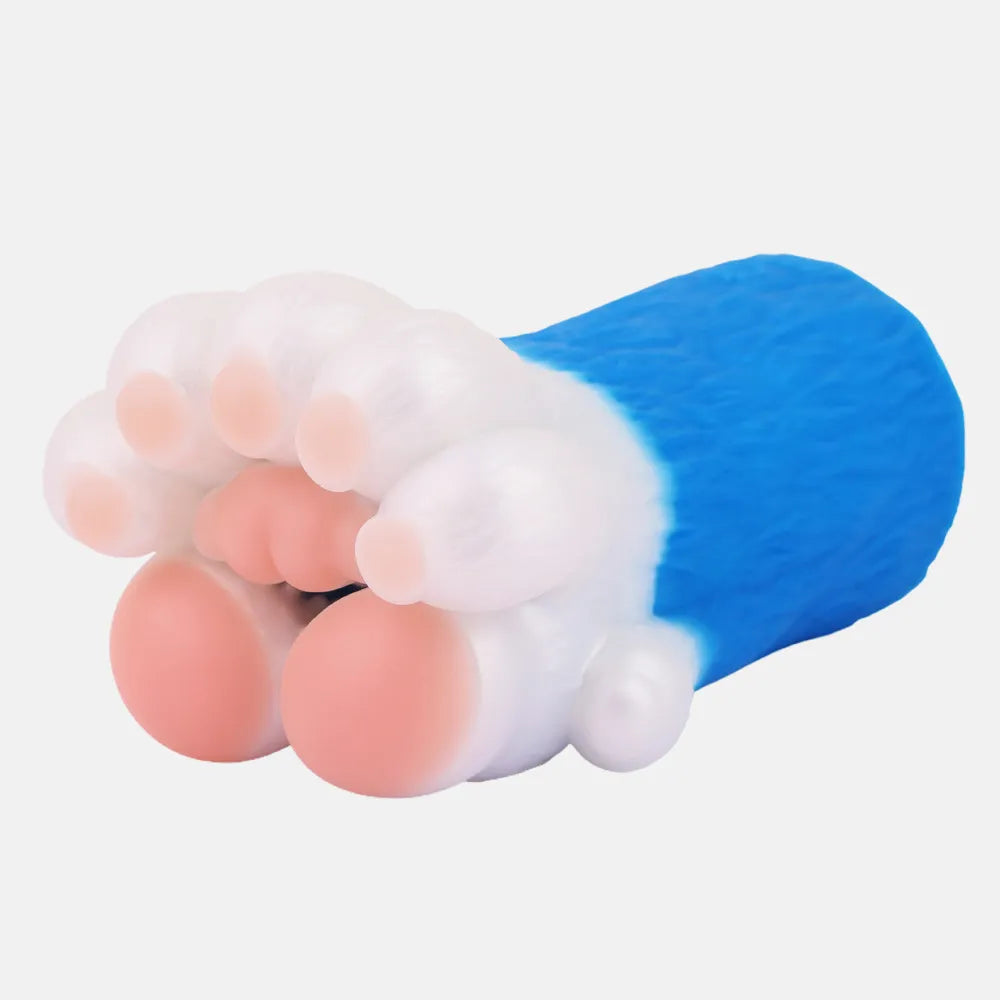 Side view of the blue Furry paw stroker resting on a white background, highlighting the cute pink entrance and furry blue silicone texture.