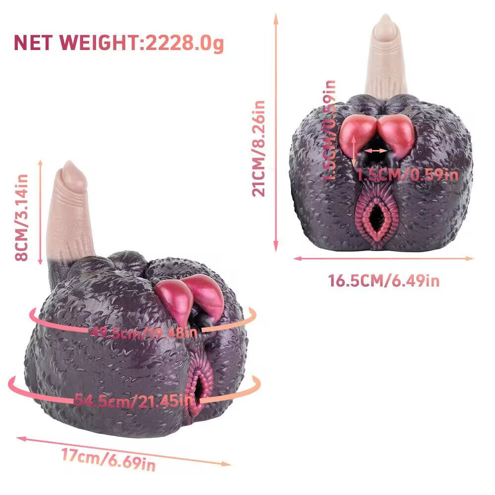 Front and angled view of a 2228g dark fantasy silicone adult toy featuring alien skin texture, realistic dildo shaft, and tight entrance orifice.