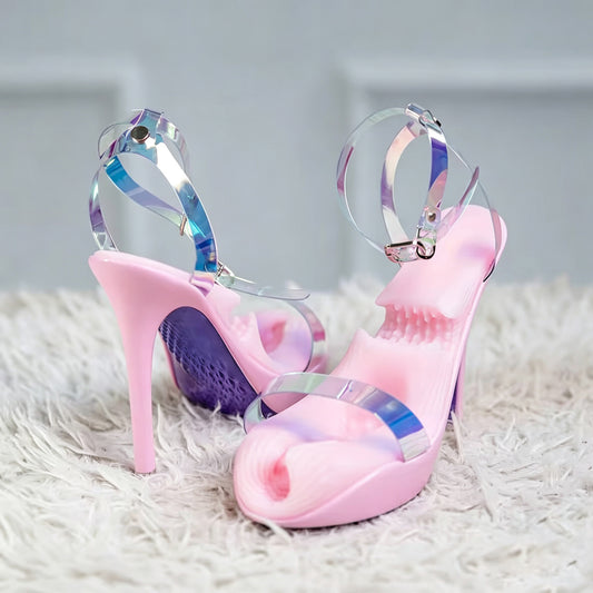 Pink high heel male masturbator showing iridescent holographic ankle strap and textured silicone pleasure channel entry.