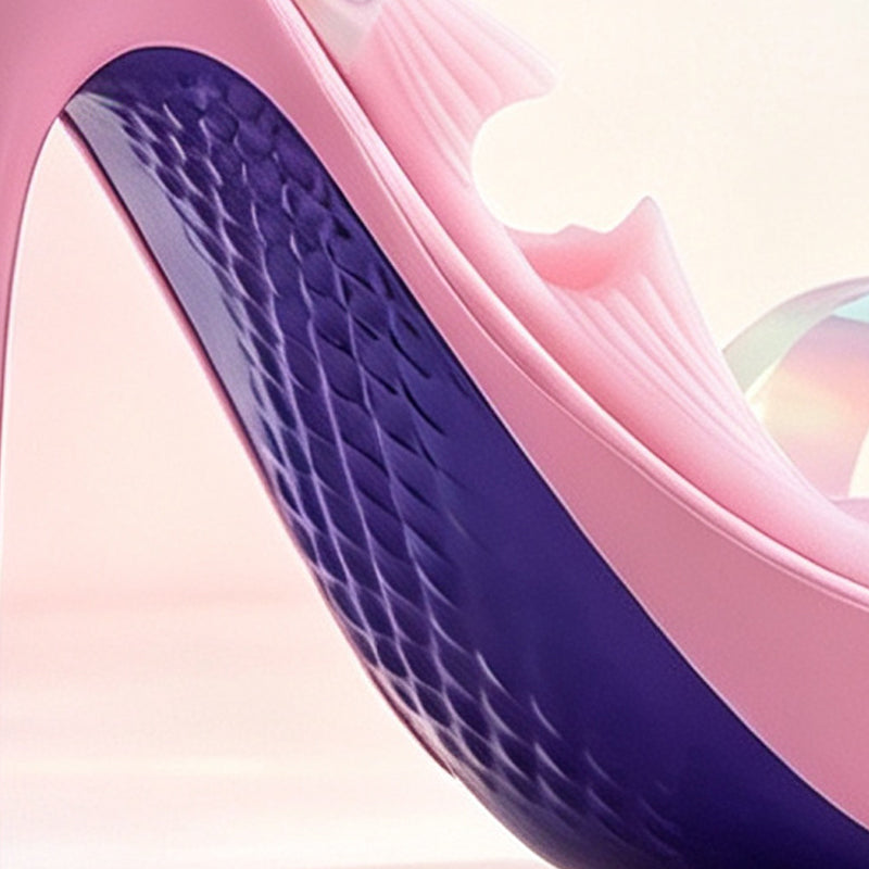 Detailed macro view of the non-slip textured purple sole and sleek stiletto arch of the high heel masturbator.