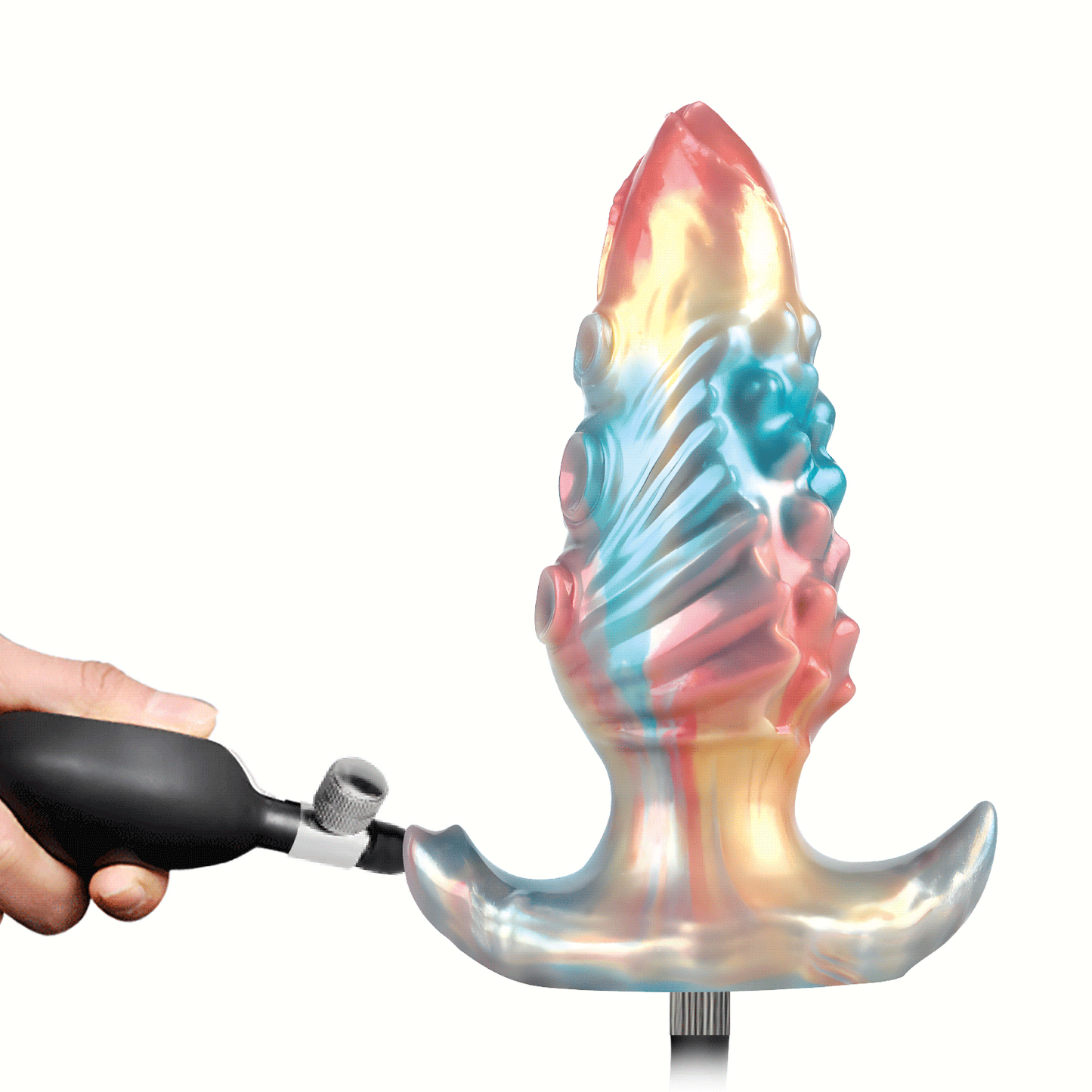 A hand squeezing the black manual bulb pump to inflate the Ebon Leviathan silicone monster dildo on a pure white background.
