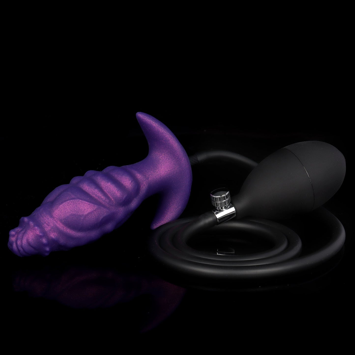 A complete inflatable anal toy kit featuring a purple textured plug connected to a flexible black hose and ergonomic rubber hand bulb pump.