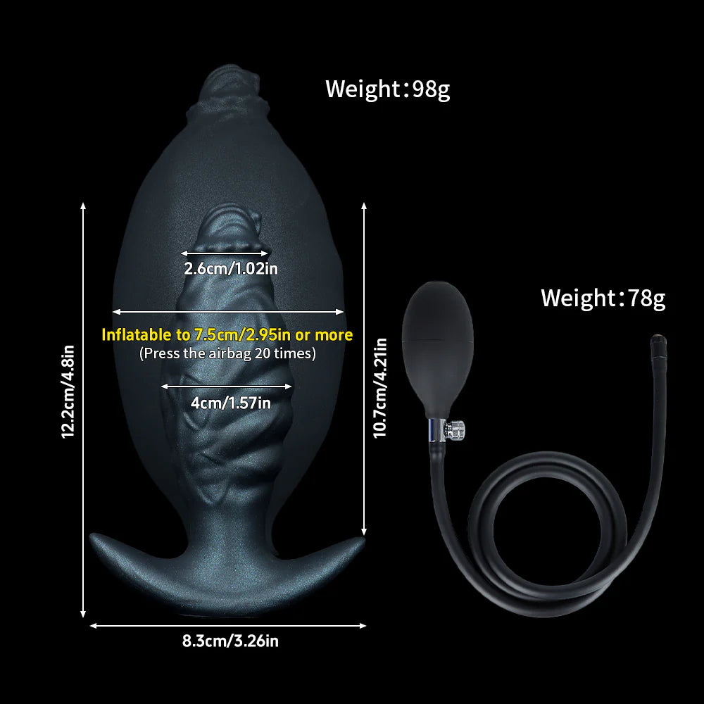 A black background showing a purple deflated inflatable butt plug connected to a black air pump and hose.
