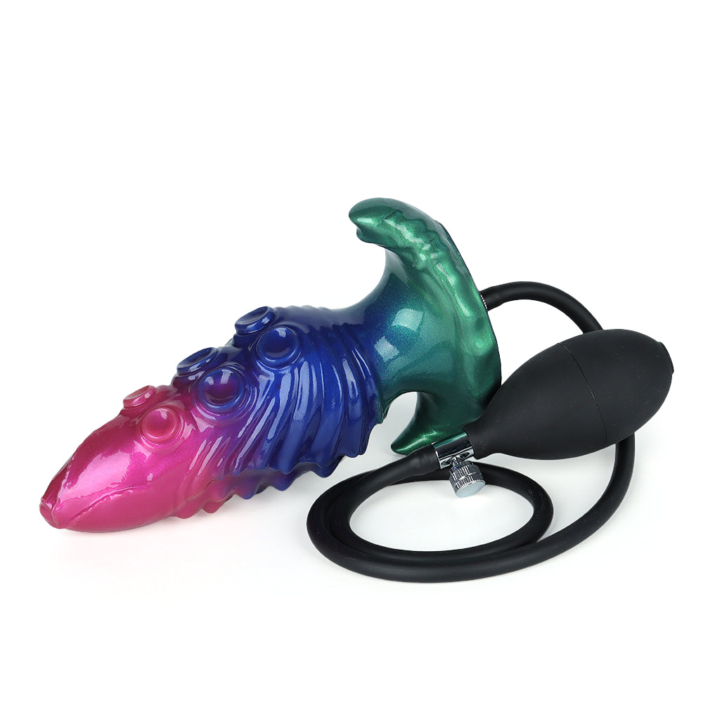 A colorful inflatable tentacle butt plug connected to a black rubber manual air pump with a release valve.