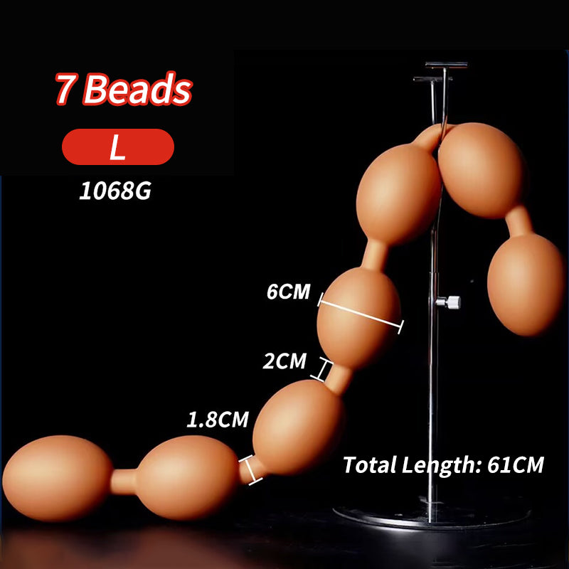 L size 7 beads silicone anal plug display showing 6cm bead diameter 61cm length 1068g weight specifications.