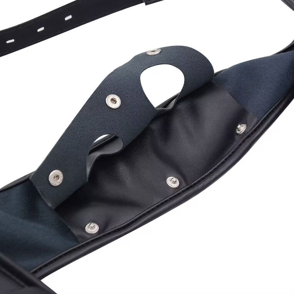 Interior design of the strap-on harness featuring heavy-duty snap buttons and leather flap for secure dildo installation