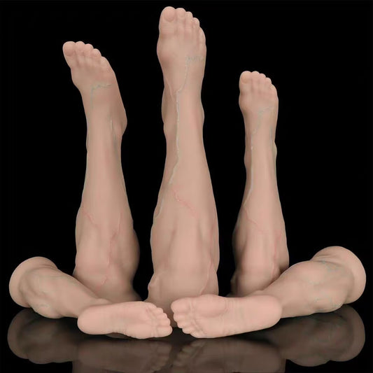 Multi-size collection of lifelike foot silicone anal plugs with realistic veins and wide suction bases.