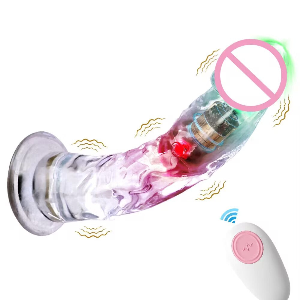 Light-up crystal vibrating dildo with compact pink wireless remote controller for partner play.