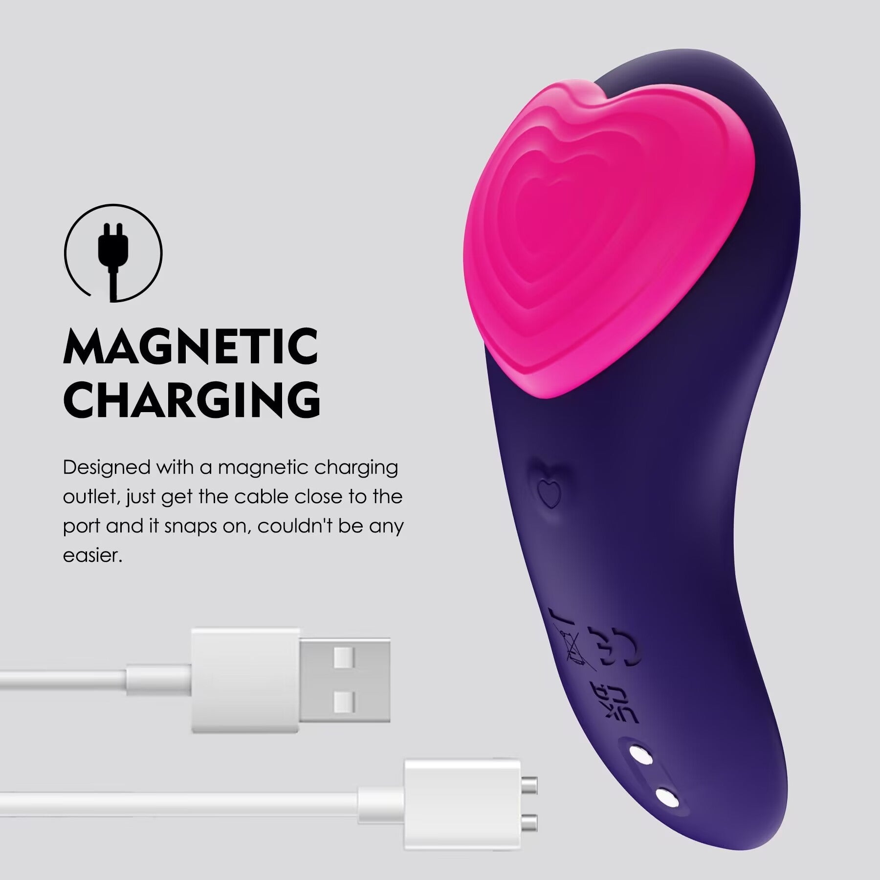 Close up of USB magnetic charging cable snapping onto a wearable panty vibrator.