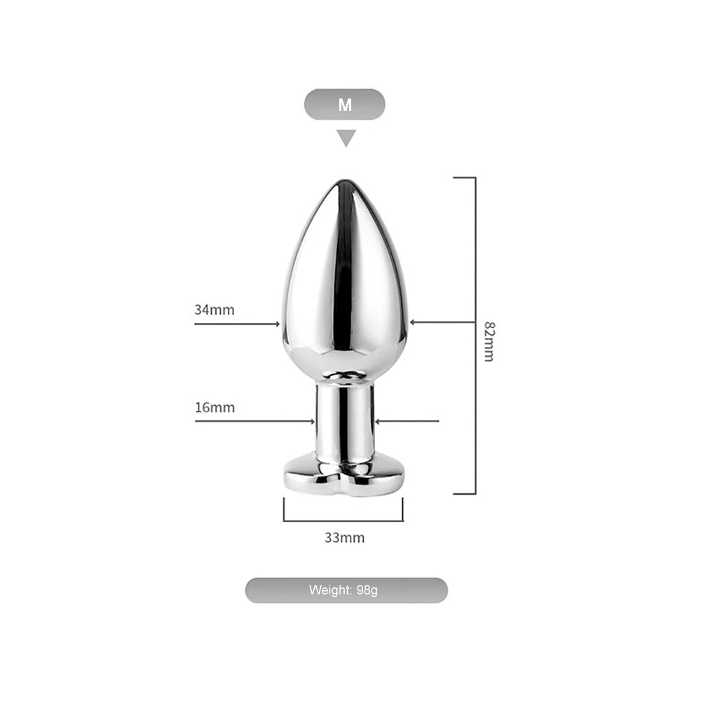 Size chart and specifications for the medium M-size metal butt plug measuring 82mm in length and 34mm in diameter.