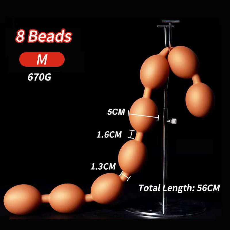 M size 8 beads silicone anal plug display showing 5cm bead diameter 56cm length 670g weight measurements.
