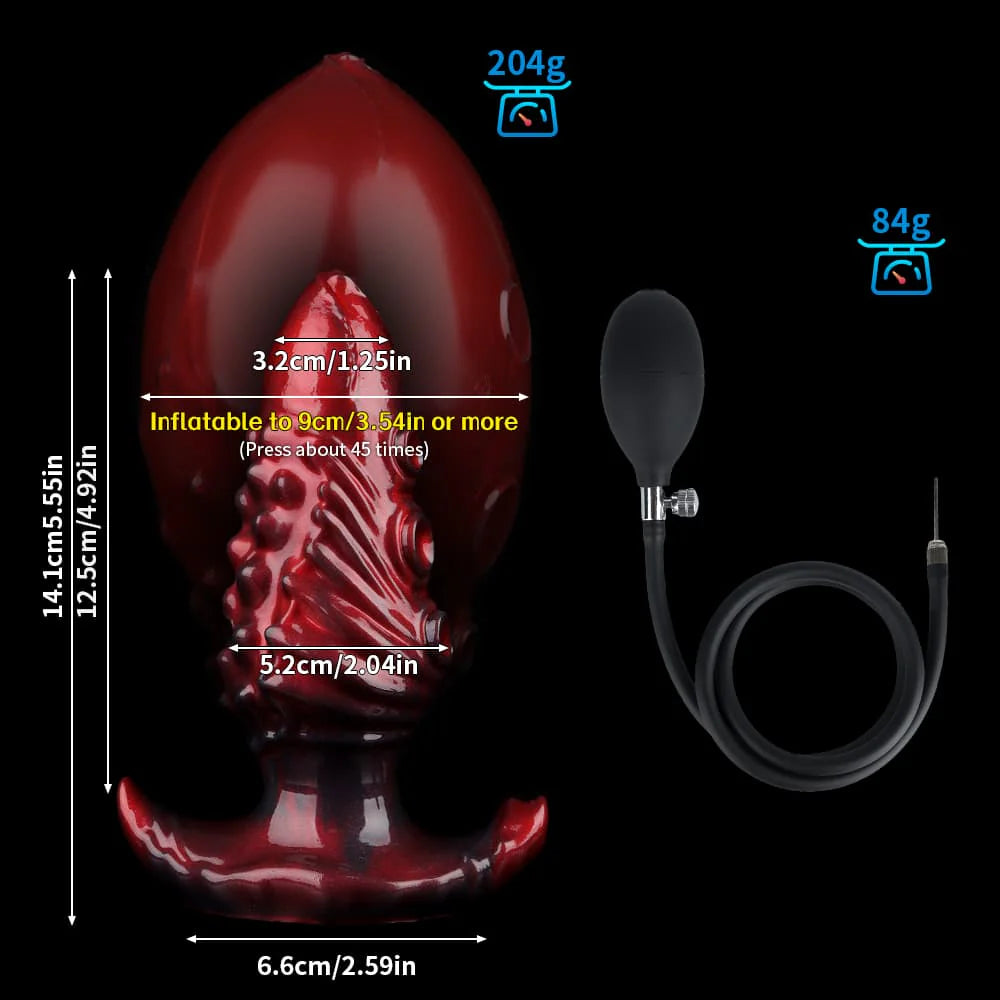 Size Medium dimension diagram for the dilating monster butt plug, indicating a total height of 14.1cm and expanding up to 9cm or more.
