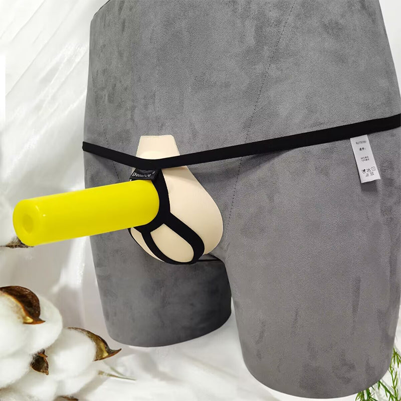 Mannequin displaying black minimalist open-back pouch thong jockstrap with ergonomic support ring for men.