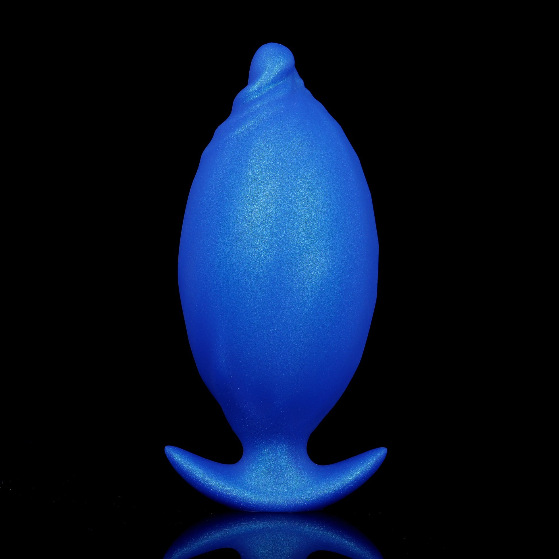 Air-expanded midnight blue premium silicone butt plug standing vertically, demonstrating sleek skin styling and maximum width capacity.