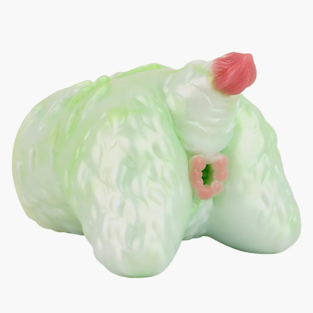 Rear view of the mint green monster fantasy male masturbator showing the pink tail and entrance.