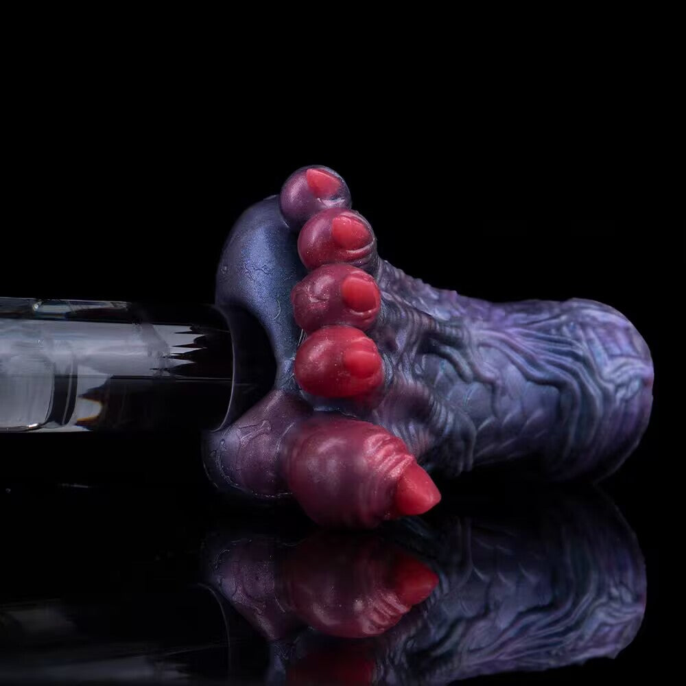 Monster paw stroker entry channel with demonstration tube inserting into the sleeve.