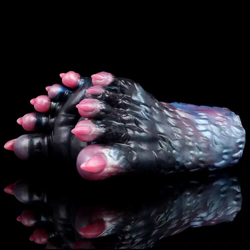 Side profile of the mythical creature paw male stroker on a reflective black background showing realistic fur and scale replication.
