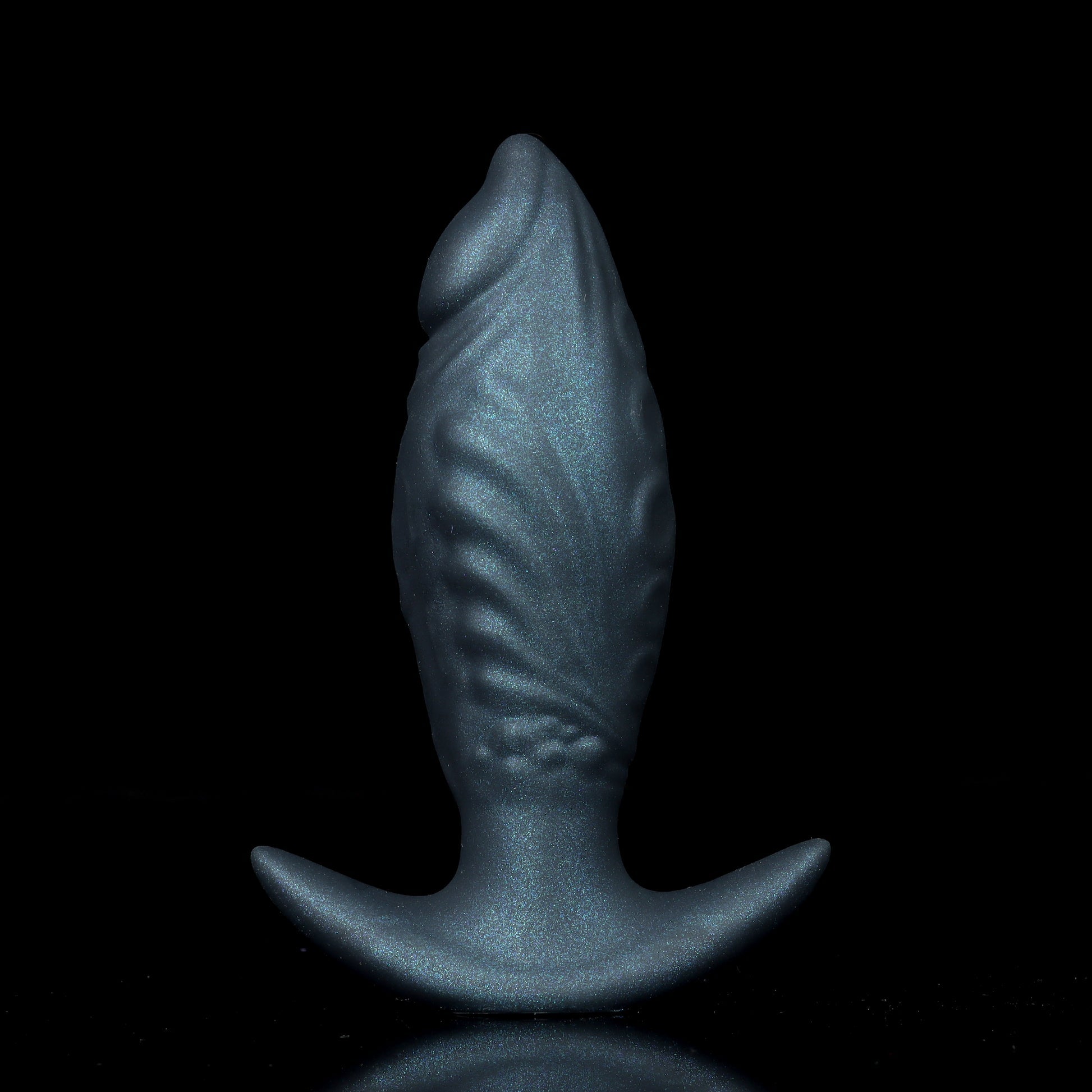 Front view of the Mystic Black fantasy dragon scale inflatable butt plug showing its intricate biological ribbing.