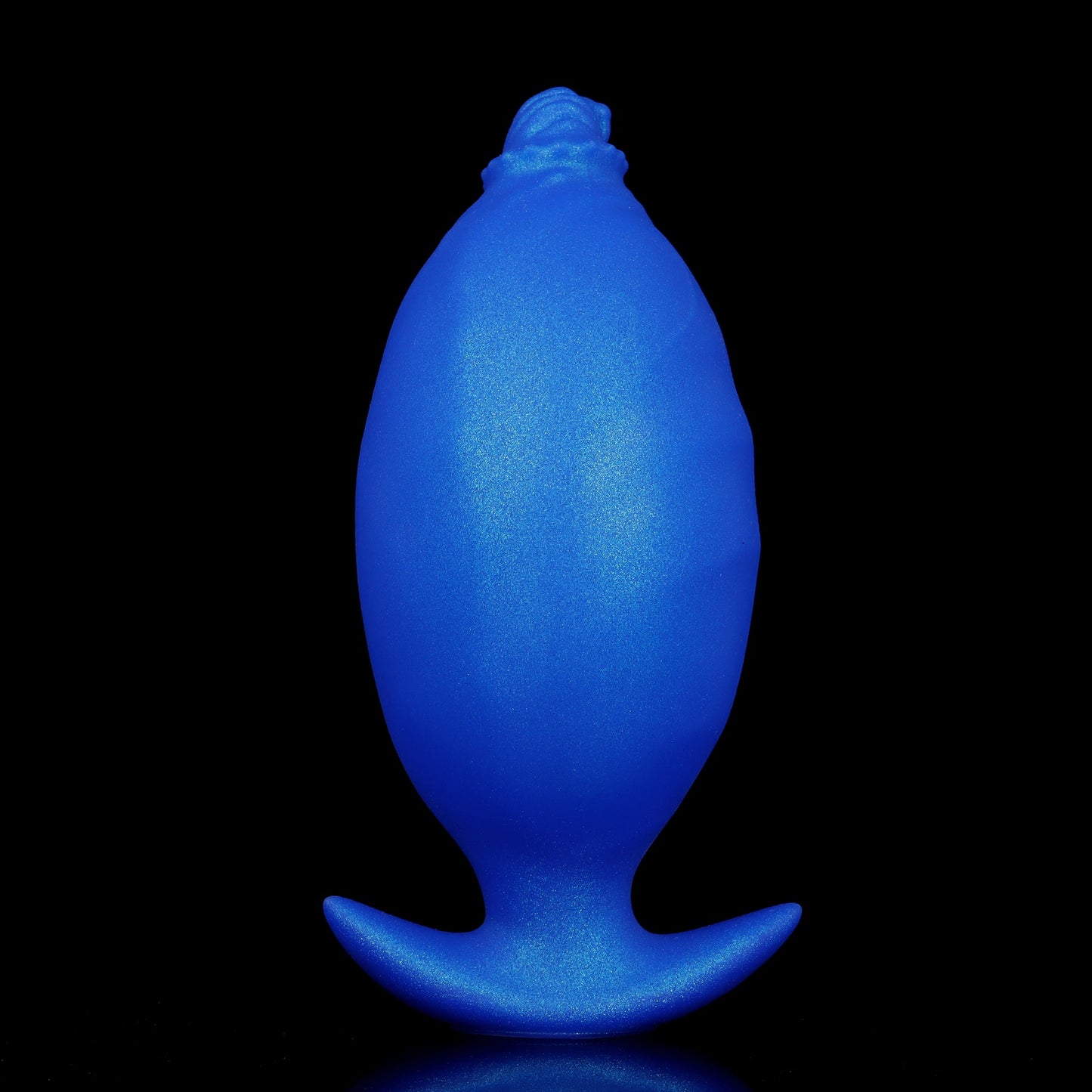 A neon blue inflatable anal plug expanded to maximum size via air pump, creating a perfectly round plump shape for custom stretching.